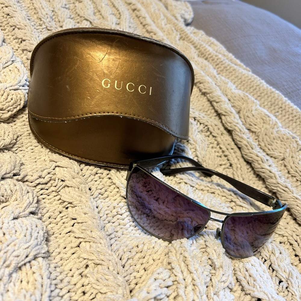 • Gucci Sunglasses •
